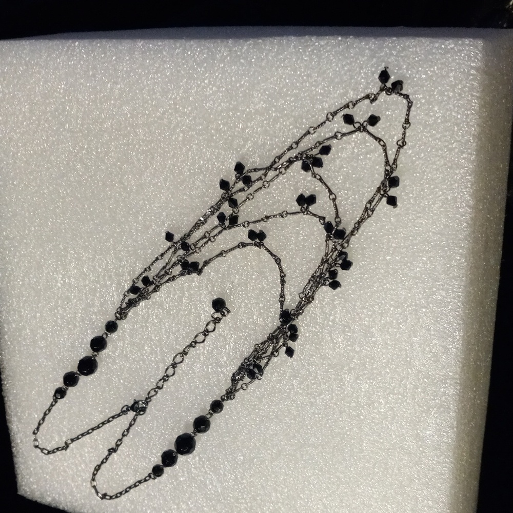 Premeir Design black crystal cut glass beads on skeleton bone chain